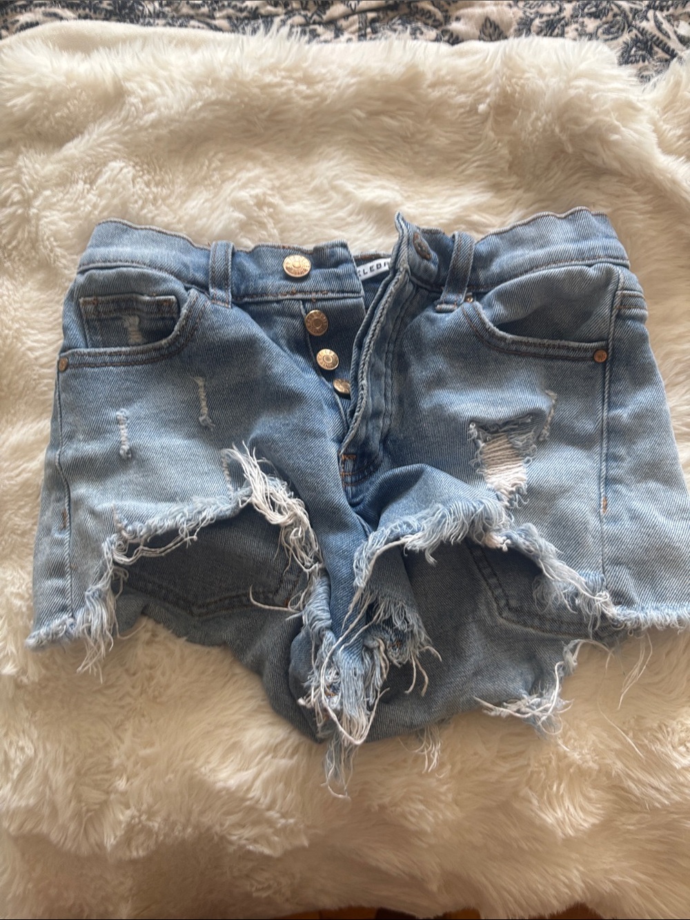 Celebrity Pink Light Blue Distressed Denim Cutoff Shorts